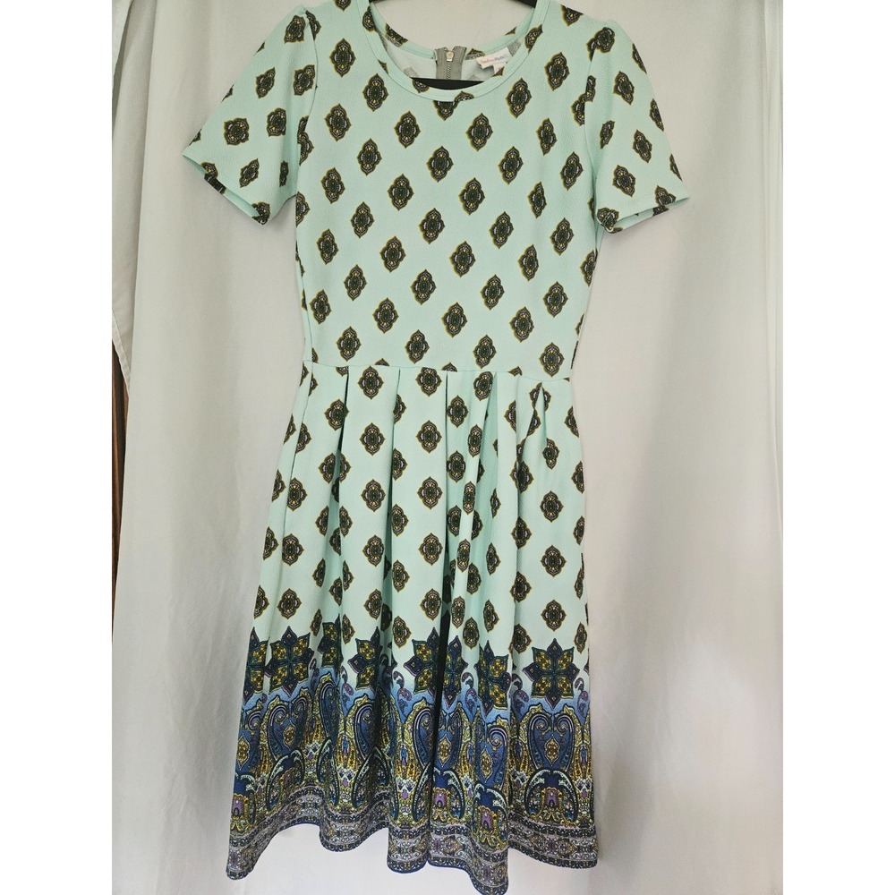LuLaRoe Amelia dress Medium mint background and a dipped pattern